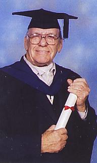 Len holding certificate